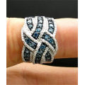 BEAUTIFUL INFINITY RING WITH BLUE SAPPHIRE CZ SET IN 925  SILVER PLATED  SIZE 10 (U 1/2)