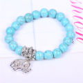 GENUINE NATURAL GEMSTONE - TURQUOISE BRACELET  WITH TIBETAN SILVER RINGS AND ELEPHANT CHARM