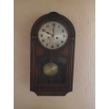 OAK CASED WALL CLOCK IN WORKING CONDITION
