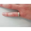 Ladies gold pinky ring with diamonds