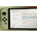 Nintendo Switch OLED Model White 64GB With White Joy-Con Controllers And 2 Titles Great Condition!