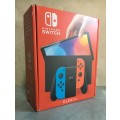 Nintendo Switch OLED Model HEG-001  64GB - Neon Red / Blue Boxed Great Condition!