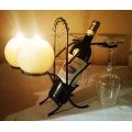 WINE BOTTLE HOLDER/DISPLAY STAND ANTIQUATED APPEARANCE AND DECORATIVE FEATURES