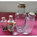 SIX DIFFERENT SIZE VINTAGE CLEAR CHEMIST-APOTHECARY BOTTLES WITH CORK STOPPERS- SEE PHOTOS