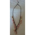 COPPER TONE NECKLACE WITH PINK CORAL PEARL LIKE STONE BEADS
