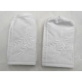 TWO VINTAGE MATCHING WHITE EMBROIDERED  SOAP COVERS