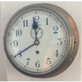 Ship's bulkhead clock 185 mm dial with original key....all brass....working, wind once per week.