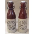 W. Daly stoneware bottles, one made by Barnett & Foster (5)