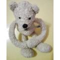 Curly Sue the Teddy Bear with Long Arms.  A Plush Nici Soft Toy with Tummy Button.