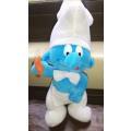 A delightful rare 'Cooking Smurf' plush toy.  24cm.