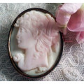 VICTORIAN SHELL CAMEO BROOCH CARVED FROM " ANGEL SKIN" CORAL SET IN 9ct GOLD FRAME