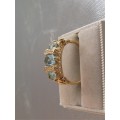 9ct Solid Gold and genuine  Blue Topaz and Diamonds Ring