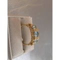 9ct Solid Gold and genuine  Blue Topaz and Diamonds Ring