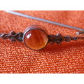 SMALL DAINTY SILVER AND AMBER BROOCH