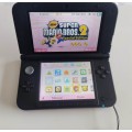 Nintendo 3ds XL console with original charger and stylus