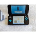 Nintendo 2ds xl with original charger and memory card
