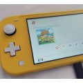 Nintendo Switch lite, charger and original packaging one digital game animal crossing new horizon