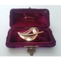 A vintage gold-plated brooch with genuine pearl in old box.  *R1 bid!!!*