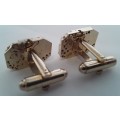 Pair gold-plated `Excello Watch Co` clock movement cufflinks.