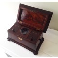 A Victorian flame mahogany tea caddy. Original flap lid boxes with Waterford crystal mixer.
