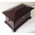 A Victorian flame mahogany tea caddy. Original flap lid boxes with Waterford crystal mixer.