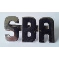 3 x SBA metal shoulder titles. Lugs intact.