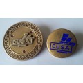 2 x `CUSA` Badges. Pins intact.