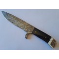 A Superb Damascus Blade Hunting Knife With Leather Sheath And Display Stand.