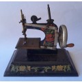 Antique German `Casige` Tin Plate Toy Sewing Machine.