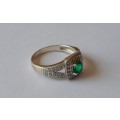 A Vintage Solid Sterling Silver Ring With Emerald Green Faceted Stone.