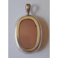 A Large And Chunky Vintage Rose Quartz Pendant With Solid Sterling Silver Surround.