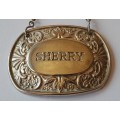 A Vintage Silver Plated `SHERRY` Bottle Decanter Label By `Ianthe, England`.