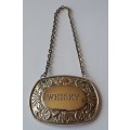 A Vintage Silver Plated `WHISKY` Bottle Decanter Label By `Ianthe, England`.