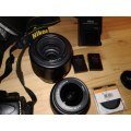 Nikon D3100 DSLR with 18-55mm & 55-200mm lenses and Lowepro bag