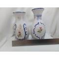 Pair of vintage vases in white and blue porcelain