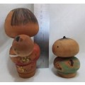 Kokeshi doll family signed by artist