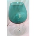 Turquoise glass goblet style vase