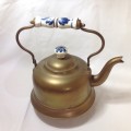 Brass kettle with ceramic handle