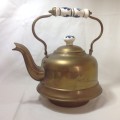 Brass kettle with ceramic handle