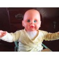 Cute blue eyed 1980s Baby doll