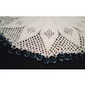 White Vintage crocheted jug cover with turquoise glass beads