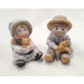 Little boy and girl figurines