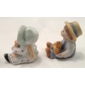 Little boy and girl figurines