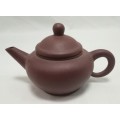 A Vintage purple clay Teapot miniature