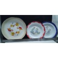 Three vintage enamel plates