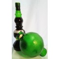 Beautiful vintage green glass Chianti wine bottle with glass shade