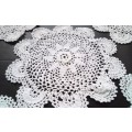 Five small Crocheted doilies - about 12cms across