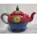 Very old funky elephant teapot in vivid colours