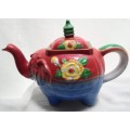 Very old funky elephant teapot in vivid colours