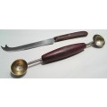 Two vintage utensils - cheese knife and melon baller